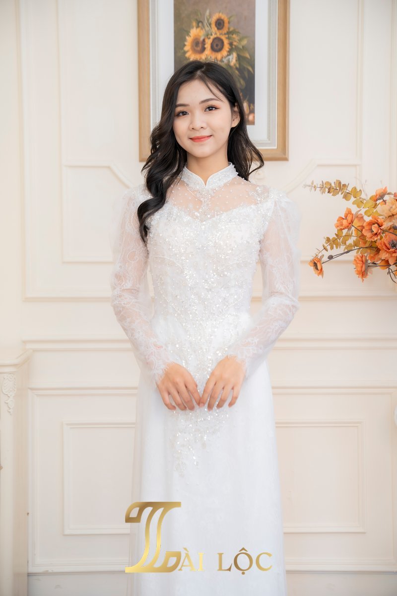 Áo Dài Cưới Cô Dâu Ren Trắng Hoa Văn Đối Xứng