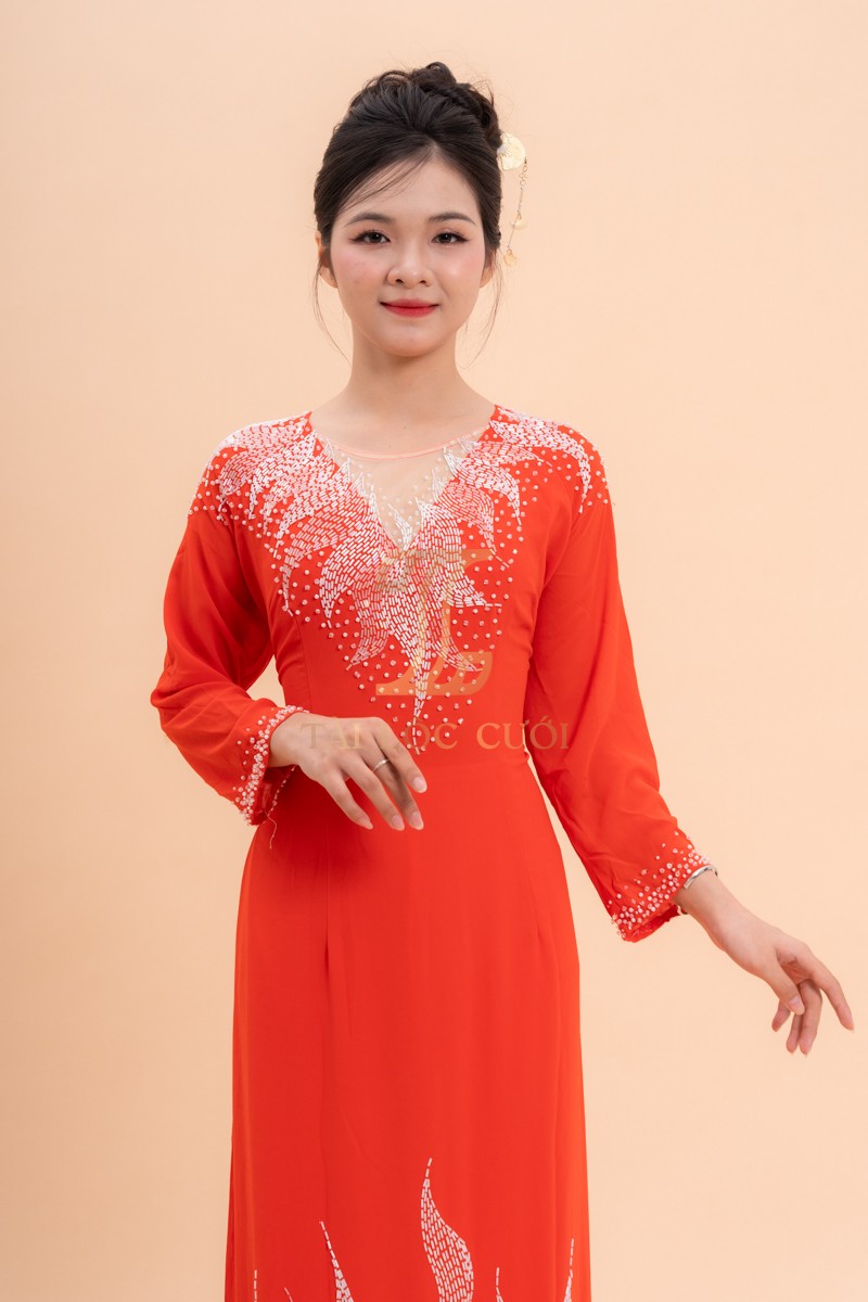 Đôi nét về áo dài ngồi sui cam lụa cổ ren kết cườm cao cấp Đôi nét về áo dài ngồi sui cam lụa cổ ren kết cườm cao cấp